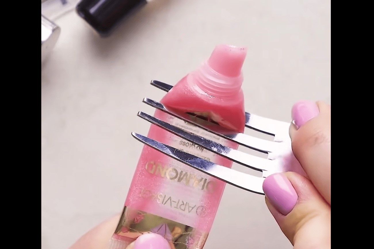 How to squeeze out the last drops of lip gloss effortlessly.jpg